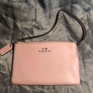 2 Slightly Used Coach Wristlet